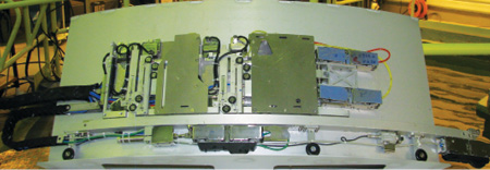 The T-hin manipulator has both left and right configurations to allow certain obstructions to be examined from two sides, facilitating parallel examination of like welds.